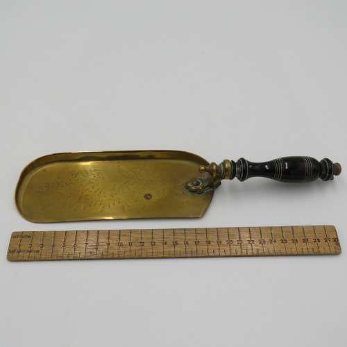 Antique brass and wood silent batter