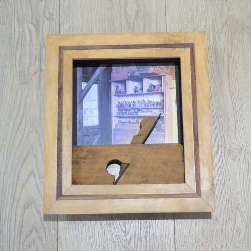 Antique woodwork plane in frame - 39 x 35 cm