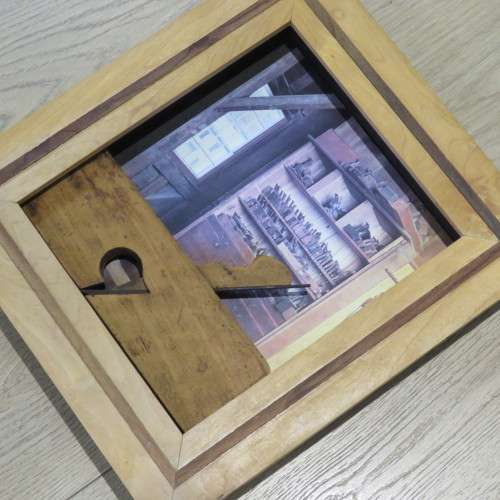 Antique woodwork plane in frame - 39 x 35 cm