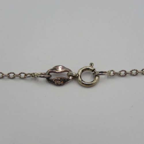 Sterling silver necklace and pendant with very small diamond - Weighs 2,1 grams - Length 46 cm