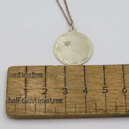 Sterling silver necklace and pendant with very small diamond - Weighs 2,1 grams - Length 46 cm