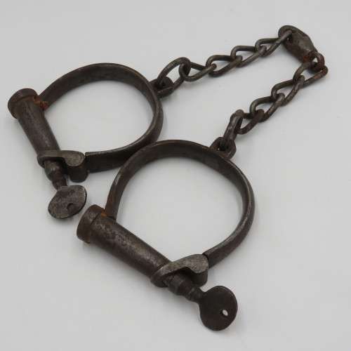 Antique Hiatt iron foot cuffs with keys