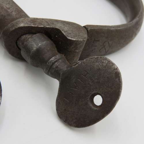 Antique Hiatt iron foot cuffs with keys