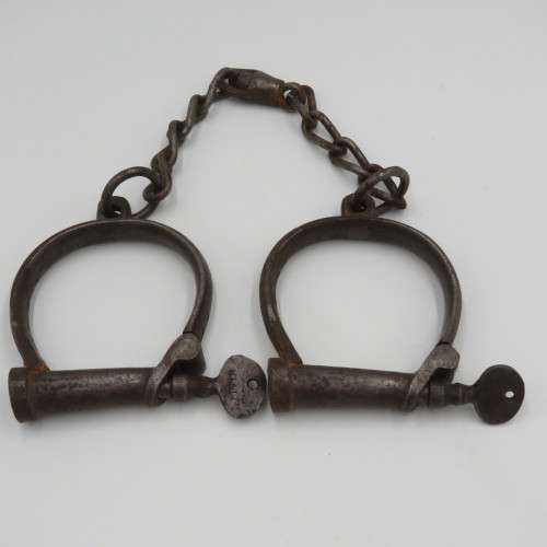 Antique Hiatt iron foot cuffs with keys