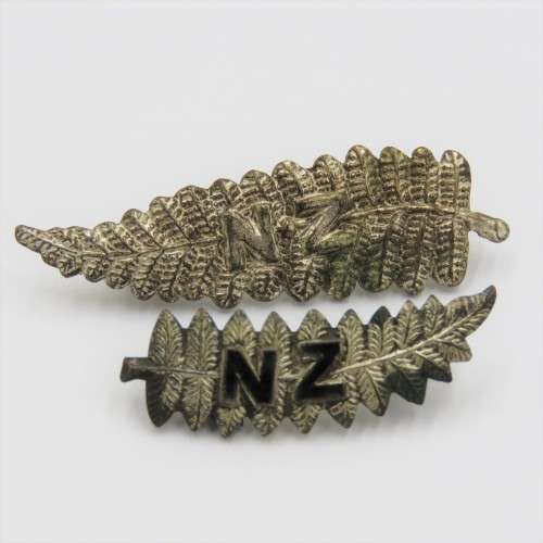 Pair of New Zealand silver fern pin badges