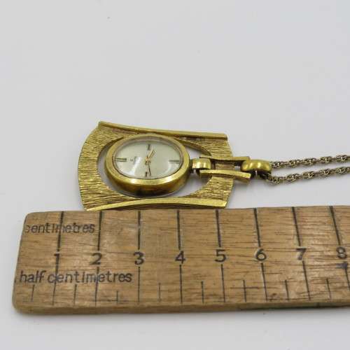 Vintage Delfin Edox goldplated pendant watch with gold colored necklace