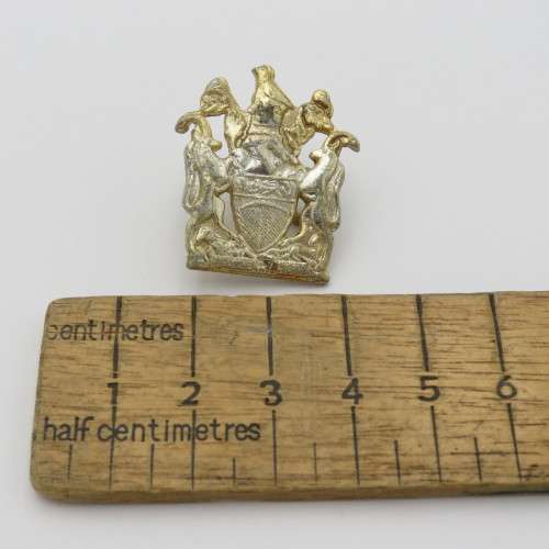 Rhodesia Native Department cap badge with lugs