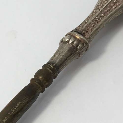 Boot lace puller with silver handle
