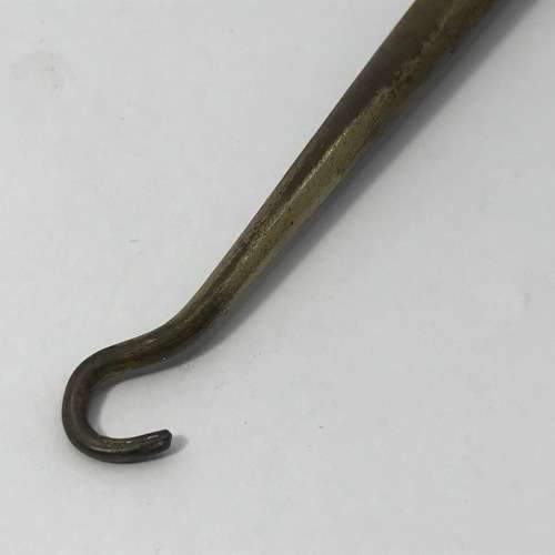 Boot lace puller with silver handle