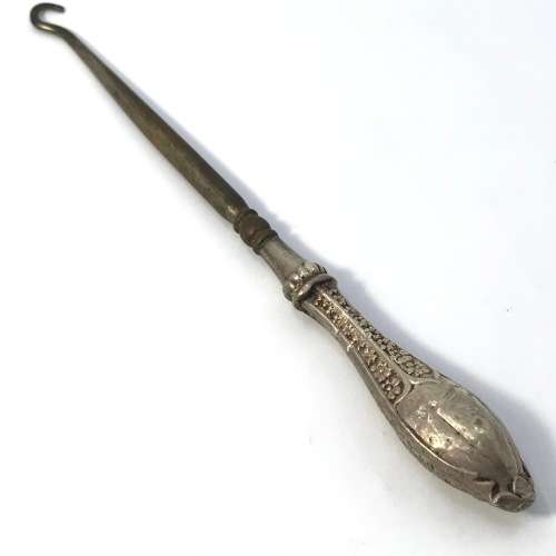 Boot lace puller with silver handle