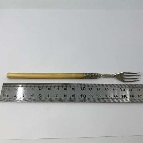 Victorian Sheffield silver pickle fork with bone handle