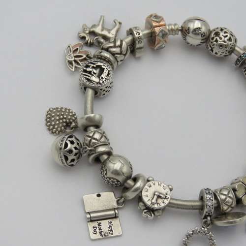 Annabelle sterling silver charm bangle/bracelet with charms - Weighs 61,1 grams - 18 cm