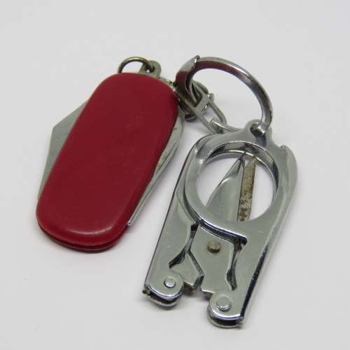 Vintage pocket knife and opener with pocket scissors