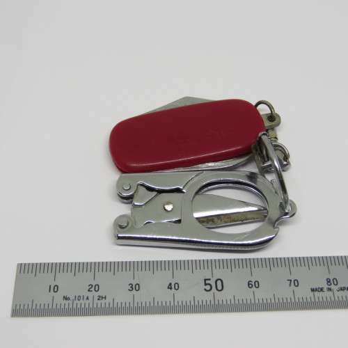 Vintage pocket knife and opener with pocket scissors