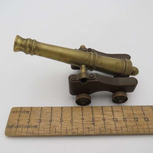 Vintage brass and wood cannon model
