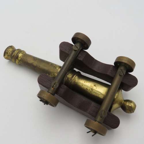 Vintage brass and wood cannon model
