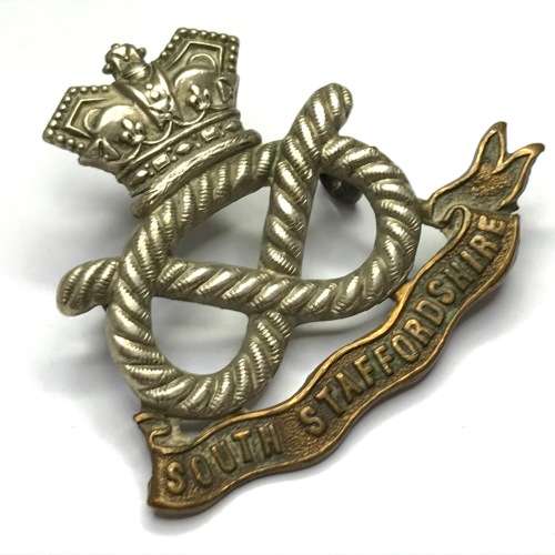 Boer War South Staffordshire Regiment cap badge with lugs - left ribbon broken