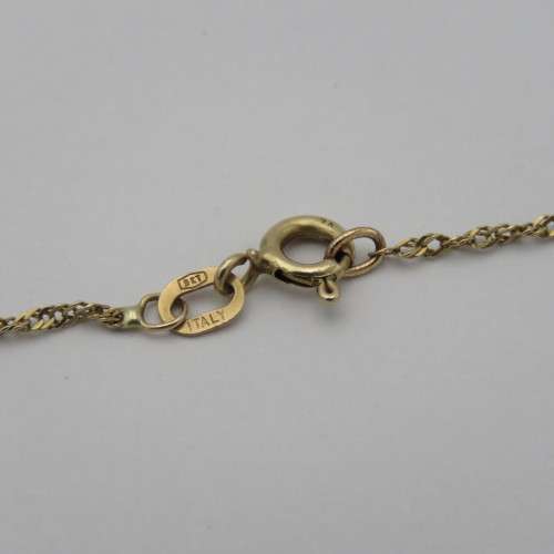 9kt Gold cross pendant and necklace with Garnet and small diamonds - Weighs 2,4 grams - Length 50 cm