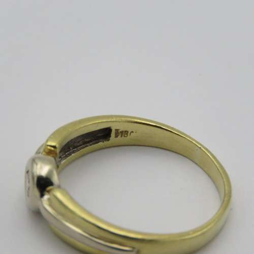 18kt White and yellow gold diamond ring - appr. 0,15ct - Weighs 5,6 g - Size S