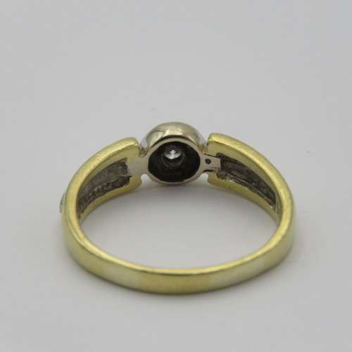 18kt White and yellow gold diamond ring - appr. 0,15ct - Weighs 5,6 g - Size S