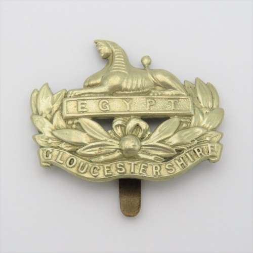 The Gloucestershire regiment cap badge with slide