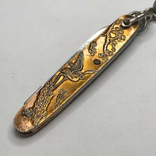 Vintage keyring pocket knife with stork design