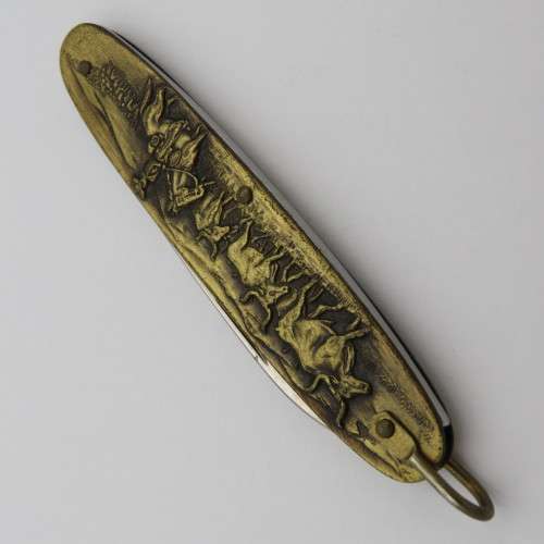 Vintage Inox pocket knife with brass cowboy motif