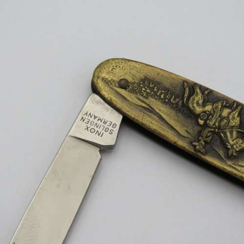 Vintage Inox pocket knife with brass cowboy motif
