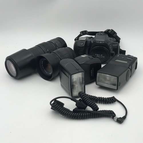 Minolta Maxxum 500 Si Super 35mm camera with two lenses, two flashes, lens filters and bag