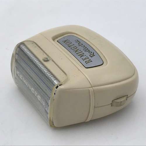 Vintage Remington Rollectric auto-home electric shaver