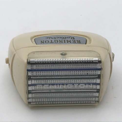 Vintage Remington Rollectric auto-home electric shaver
