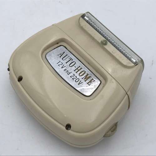 Vintage Remington Rollectric auto-home electric shaver