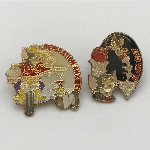 Lot of 7 Tom and Jerry pin badges issued by Steers