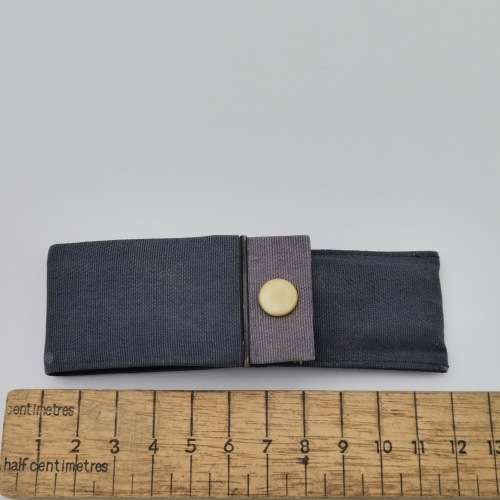 Vintage pocket clothing hanger in pouch