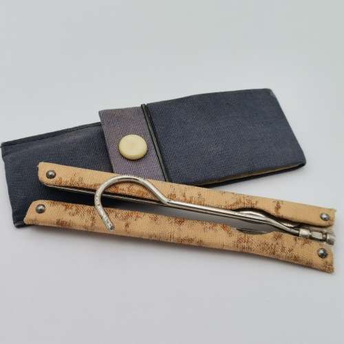 Vintage pocket clothing hanger in pouch