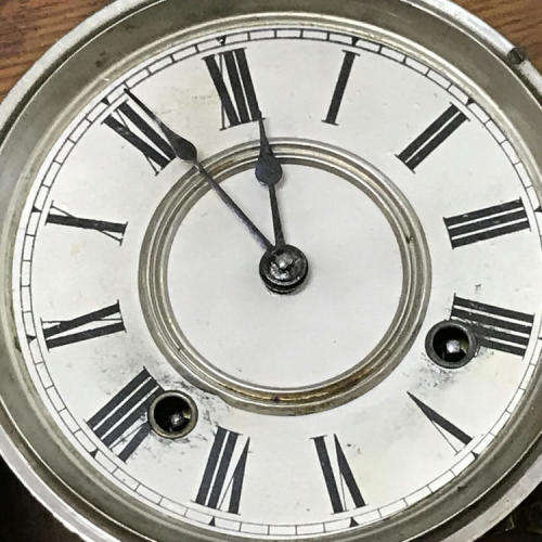 Antique Ansonia wall clock with beautifully decorated door
