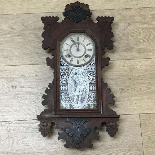 Antique Ansonia wall clock with beautifully decorated door