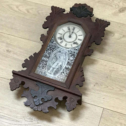 Antique Ansonia wall clock with beautifully decorated door