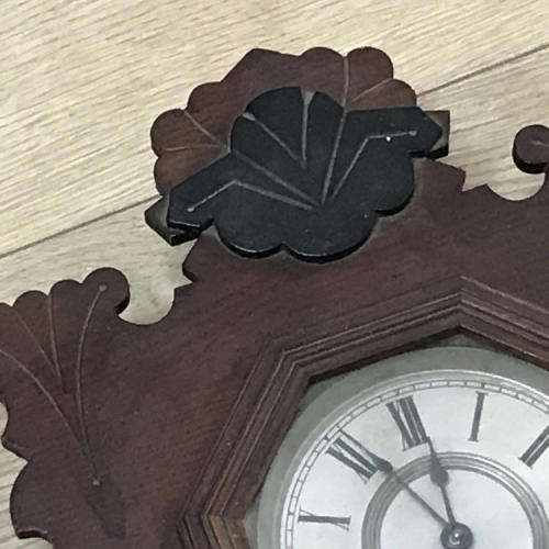 Antique Ansonia wall clock with beautifully decorated door