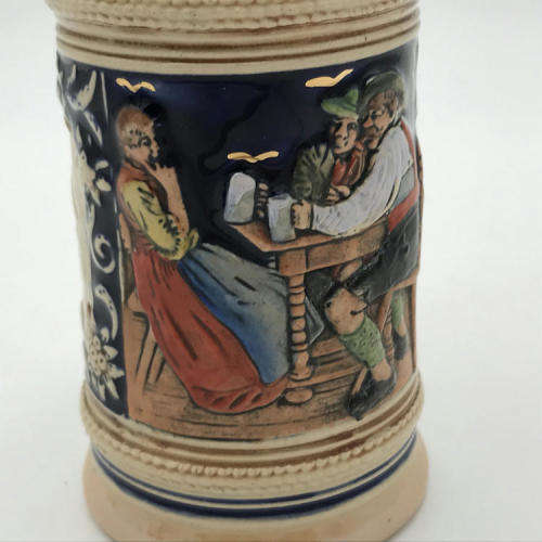 Vintage German beer stein with lid