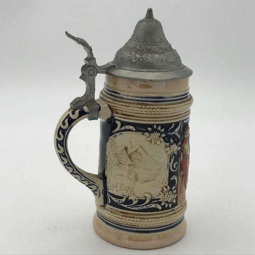 Vintage German beer stein with lid