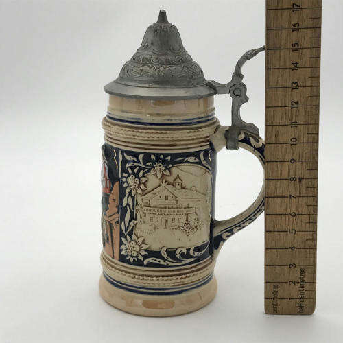 Vintage German beer stein with lid