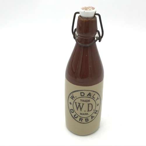 Antique W. Daly, Durban ceramic ginger beer bottle with lid