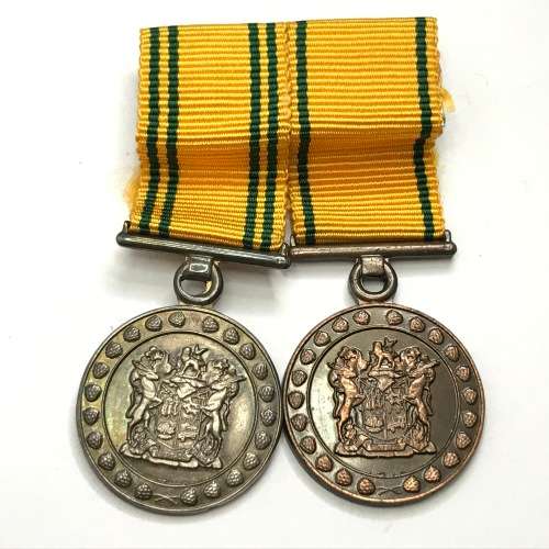 Pair of SA Prison Service miniature medals - 10 Year #1029, 20 year #457