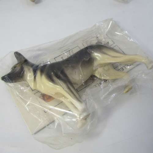 Lot of 7 collectible plastic dogs - some duplicates