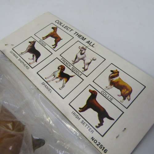 Lot of 7 collectible plastic dogs - some duplicates