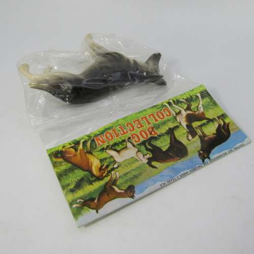 Lot of 7 collectible plastic dogs - some duplicates