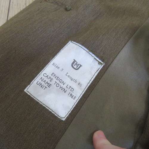 SADF mens rain coat with fold out trouser sleeves - Sizes below
