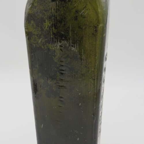 Antique J.T Beukers Schiedam green glass gin bottle