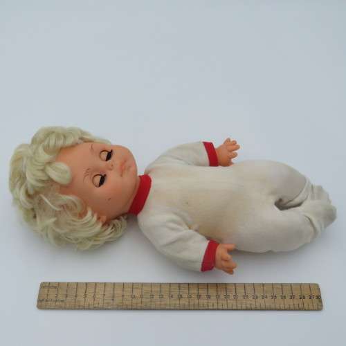 Vintage rubber baby doll with closing eyes